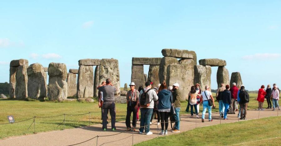London: Stonehenge, Windsor, and Bath Day Trip by Bus - Stonehenge on Salisbury Hill: the myth, the view, and the crowd reality