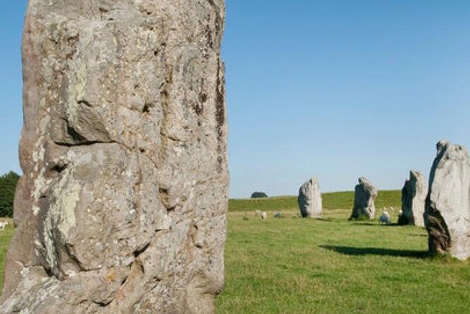 Small-Group Day Trip to Stonehenge, Glastonbury, and Avebury from London - Avebury’s giant stone circles: up close, then back to London