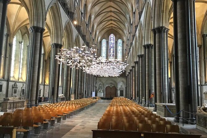 Stonehenge & Salisbury Cathedral: Private Day Trip from London - Amesbury drive-by views with commentary, not just time in the car